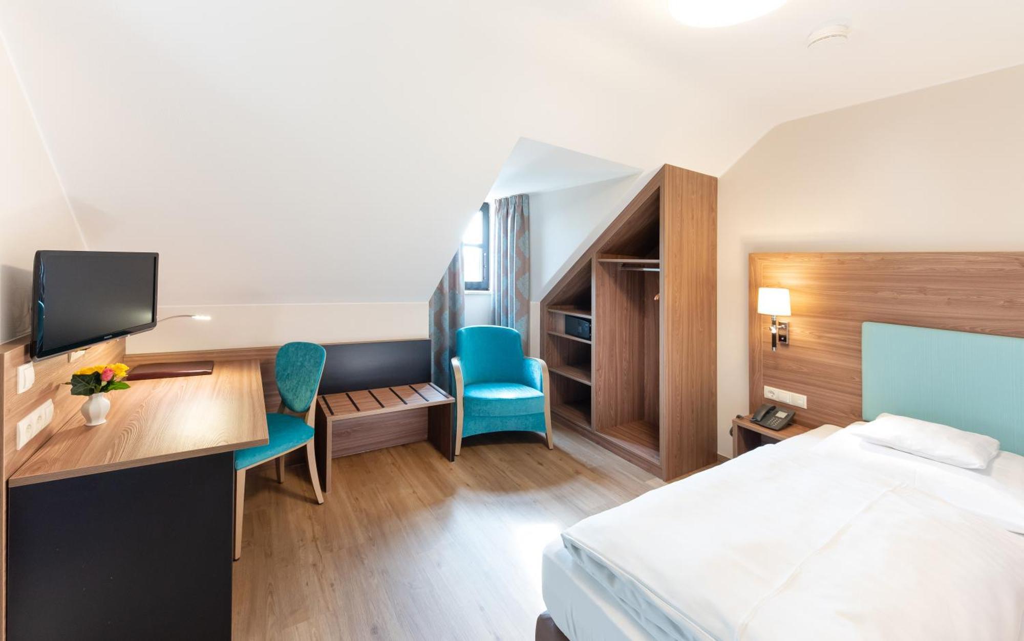Hotel Gumberger Gmbh Garni Нойфарн-бай-Фрайзінґ Номер фото